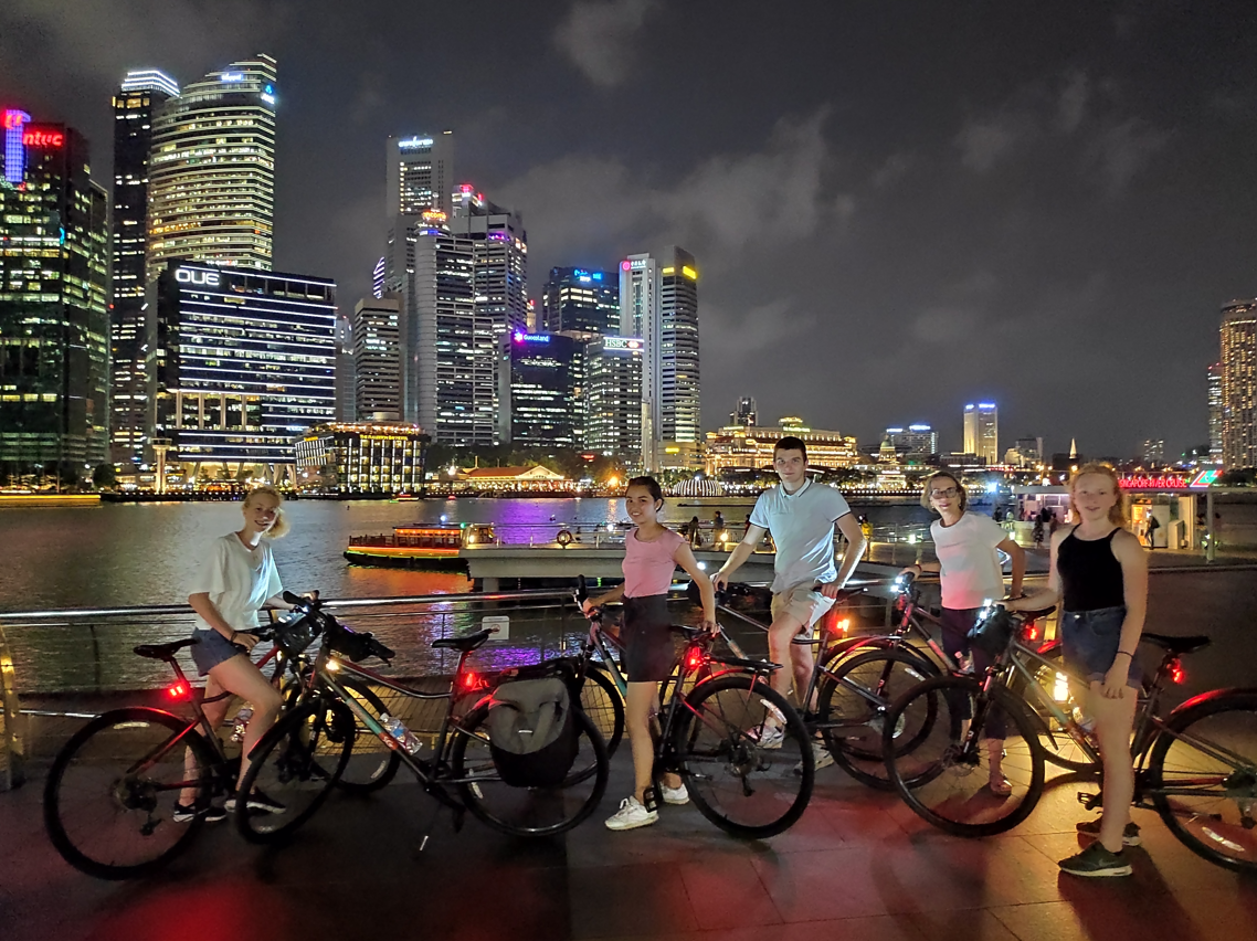 Night cycling along the Marina Bay promenade.